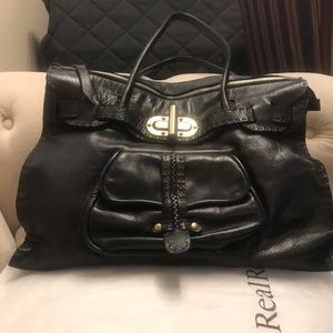 Carla Mancini leather bag Italian brand